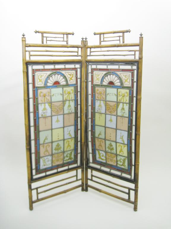 Appraisal: A bamboo two fold Screen having leaded glass panels and