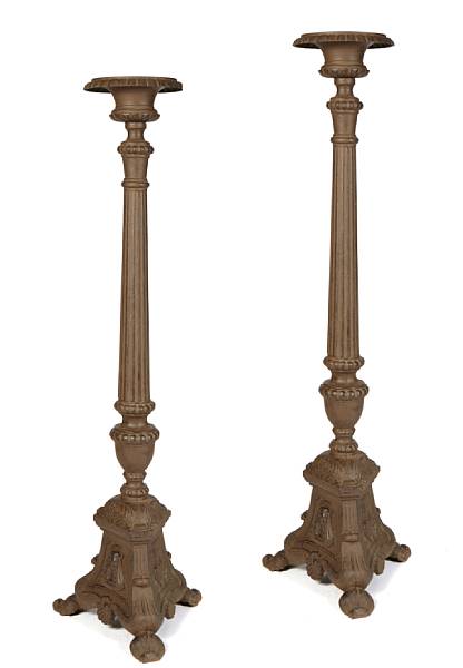 Appraisal: A pair of cast iron floor torchieres height in width