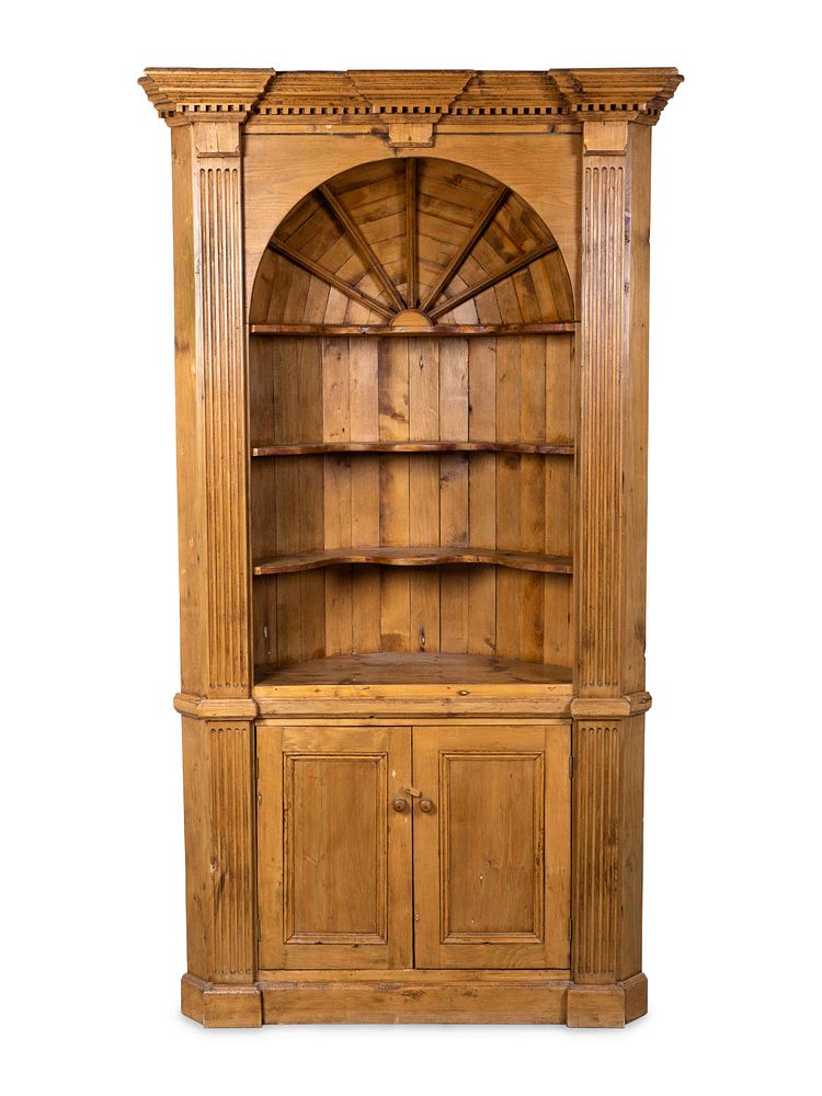 Appraisal: A George III Style Carved Pine Corner Cupboard Height x