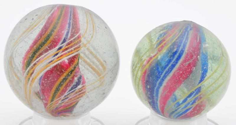 Appraisal: Lot of Large Divided Core Swirl Marbles Description The larger