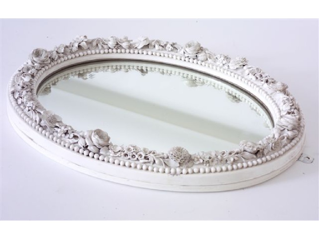 Appraisal: CONTINENTAL PORCELAIN FLORAL-ENCRUSTED MIRROR th CENTURY of oval form the