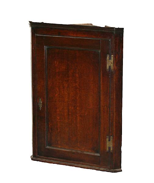 Appraisal: A George III stained hardwood hanging corner cupboard last quarter