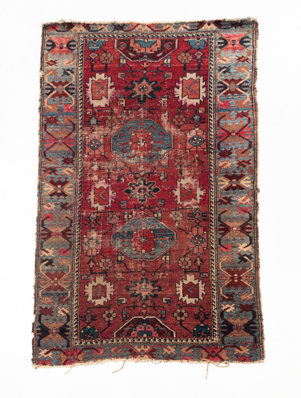 Appraisal: NORTHWEST PERSIAN KURDISH RUG Early th century Wide abrash blue