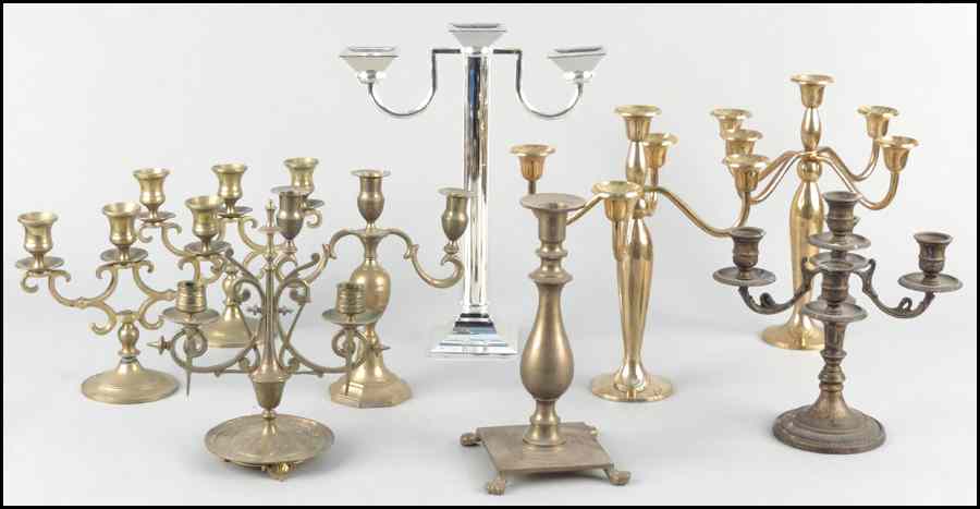 Appraisal: TWO PAIRS OF BRASS CANDELABRA Together with brass candlesticks and