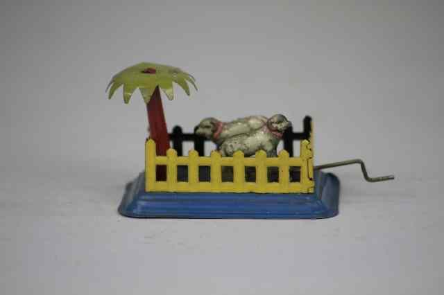 Appraisal: SHEEP IN PEN PENNY TOY Fischer embossed lithographed tin crank