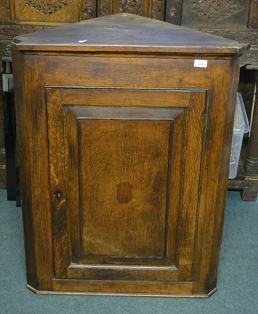 Appraisal: A th Century oak corner cupboardwith inlaid panel door cm