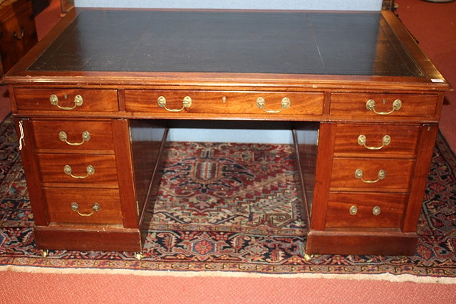 Appraisal: A th Century mahogany partners deskhaving an inset leather rectangular