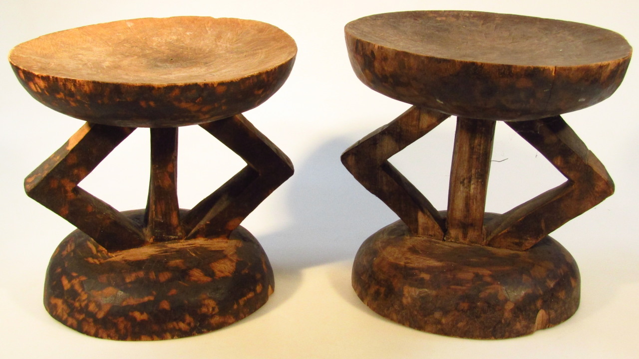 Appraisal: Two near matching mid- thC Zambian tribal hardwood headrests each