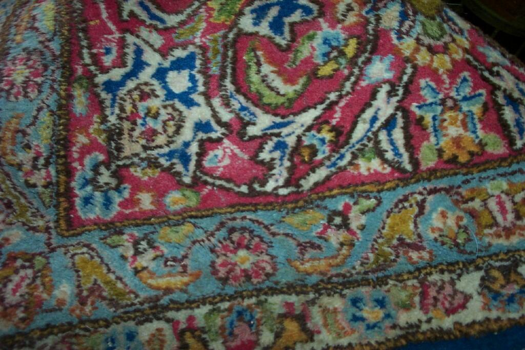 Appraisal: A substantial blue ground Persian style wool carpet with polychrome