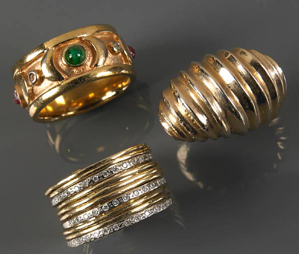 Appraisal: A collection of gold and costume rings featuring four gold