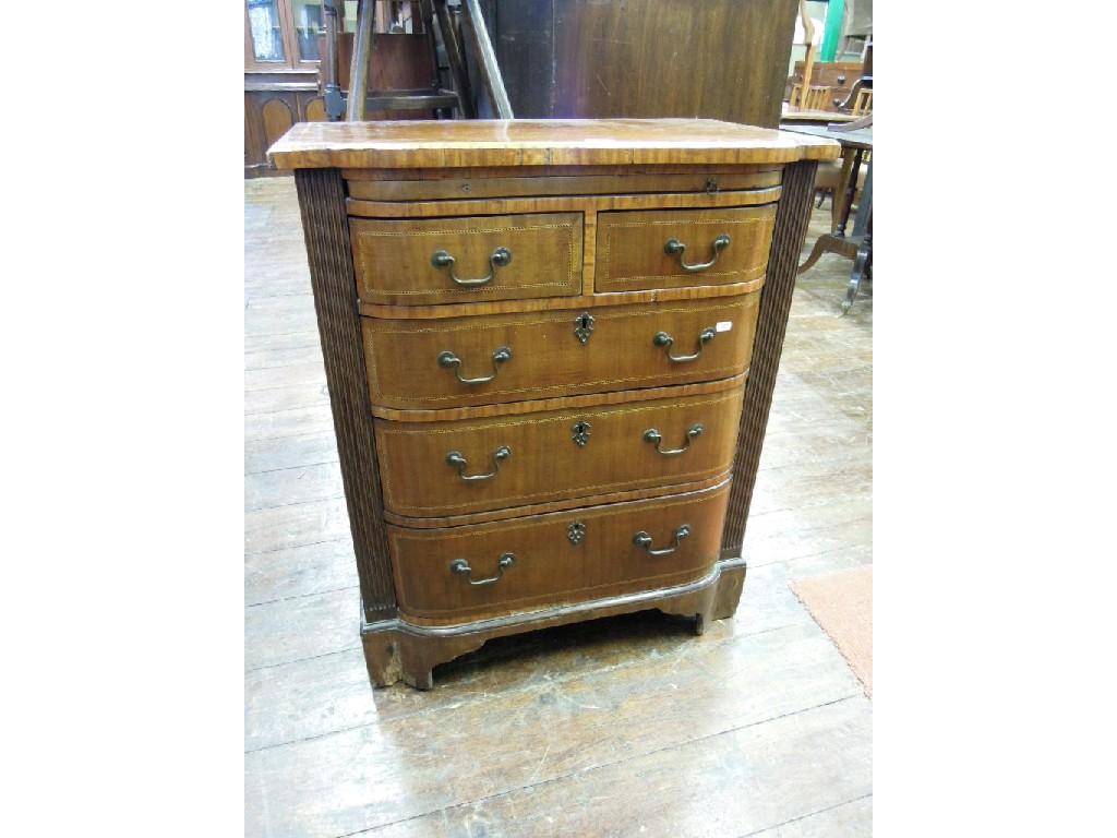 Appraisal: A small Georgian style mahogany bachelors chest with satin wood