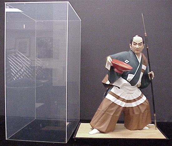 Appraisal: Male Japanese Kabuki dancer with painted costume knife and spear