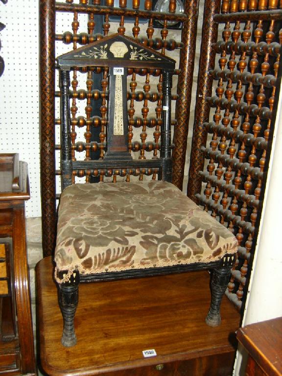 Appraisal: A th century occasional chair with turned supports with architectural