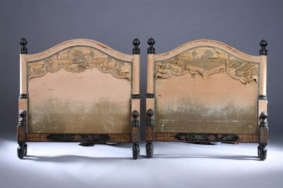 Appraisal: PAIR PAINTED AND UPHOLSTERED TWIN-SIZE BED FRAMES th century as