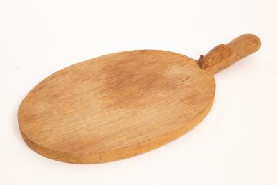 Appraisal: Robert Thompson of Kilburn - a Mouseman cheese board in