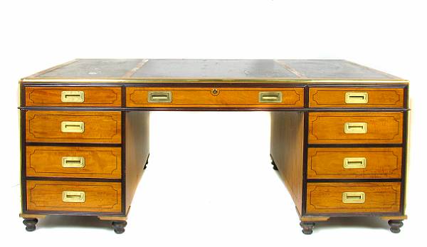 Appraisal: A campaign style inlaid satinwood partners' pedestal desk together with