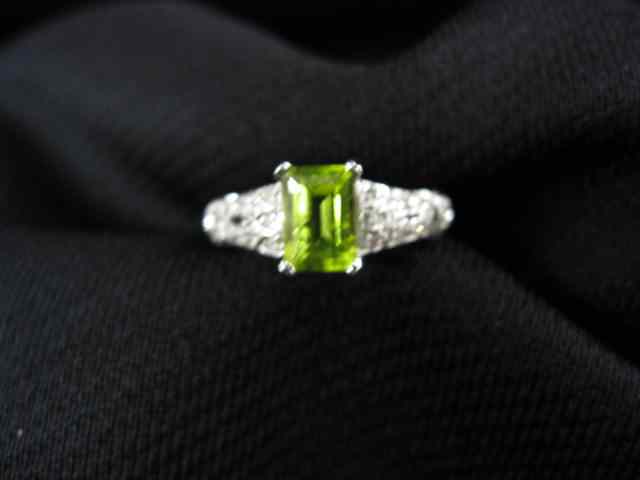 Appraisal: Peridot Diamond Ring emerald cut gem with diamonds on each