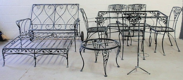 Appraisal: Wrought iron patio furniture set c to include two tables