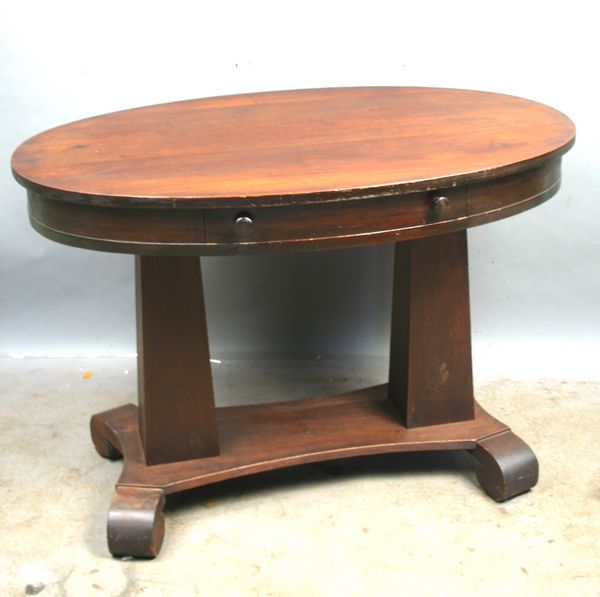 Appraisal: Late th Century Classical oval mahogany library table with drawer