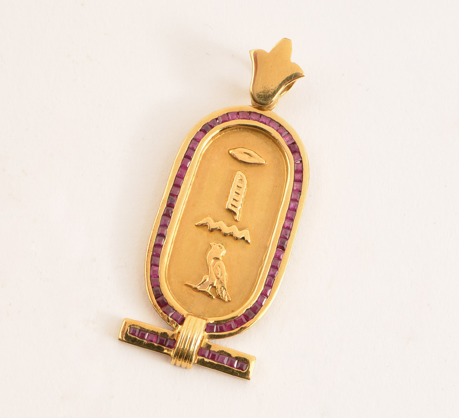 Appraisal: K GOLD AND RUBY EGYPTIAN PENDANT K yellow gold Egyptian