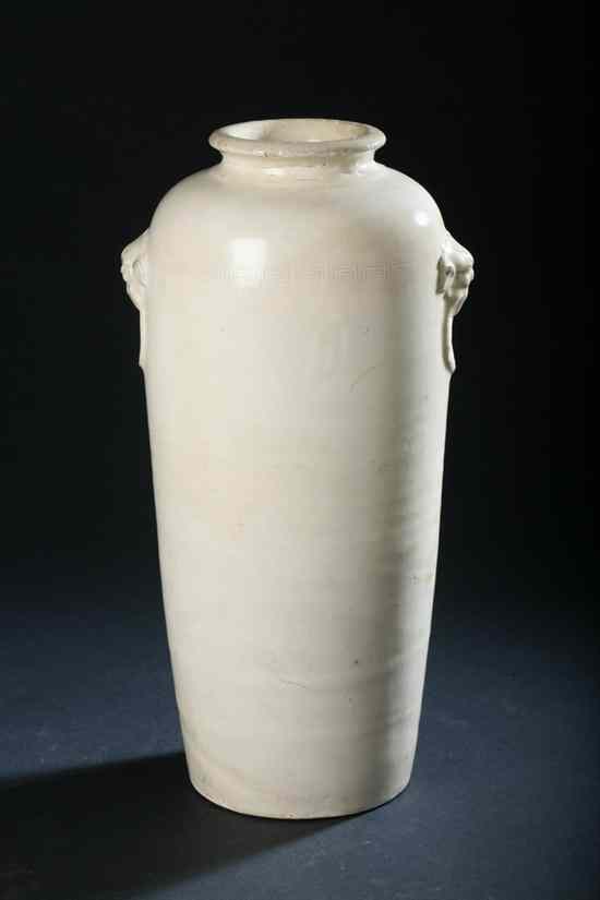 Appraisal: CHINESE MONOCHROME WHITE PORCELAIN VASE Qing Dynasty Ovoid-form molded with