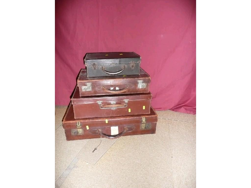 Appraisal: A group of suitcases - various sizes pressed card leather