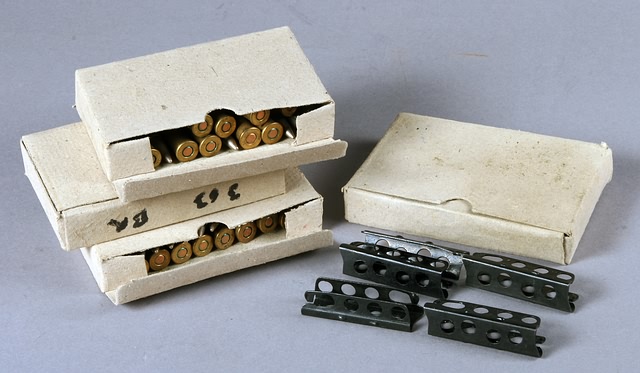 Appraisal: boxes of WWII era British Military ammunition and empty clips