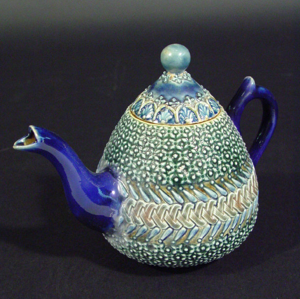 Appraisal: Doulton Lambeth stoneware bachelor's teapot with incised and relief moulded