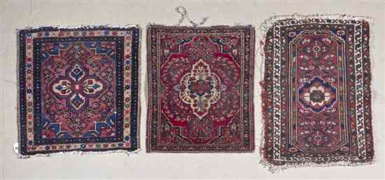 Appraisal: A Group of Persian Wool Mats comprising a Sarouk example