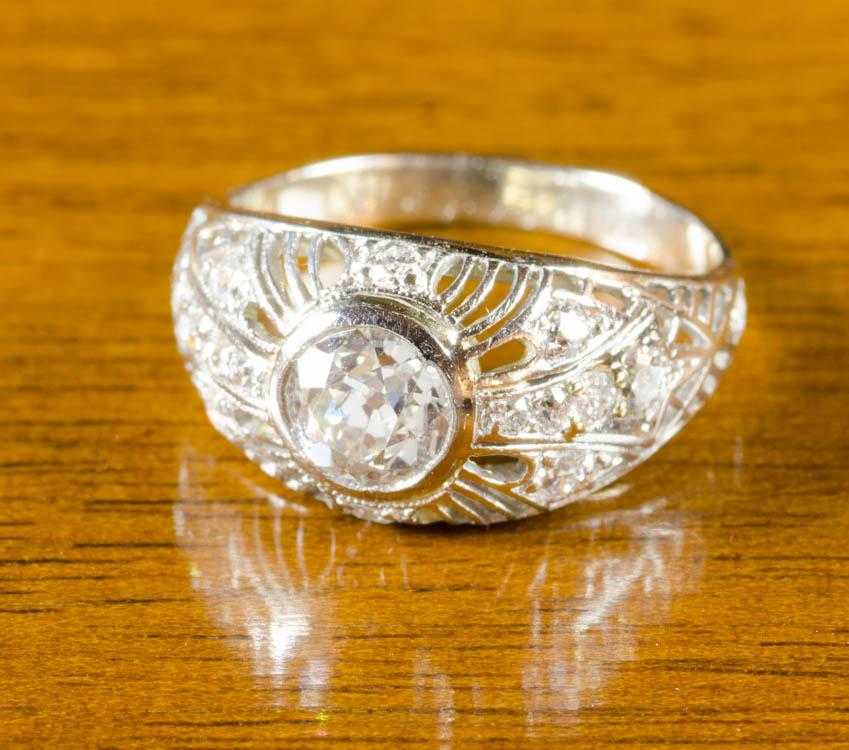 Appraisal: DIAMOND PLATINUM AND FOURTEEN KARAT GOLD RING with appraisal The