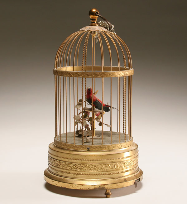 Appraisal: Victorian automaton with single bird in brass cage H In