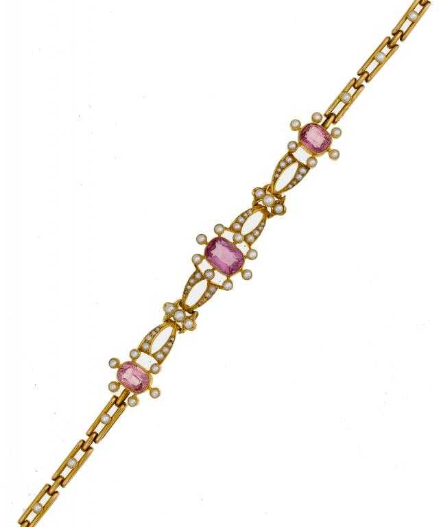 Appraisal: AN ANTIQUE PINK SAPPHIRE AND SPLIT PEARL BRACELET the three