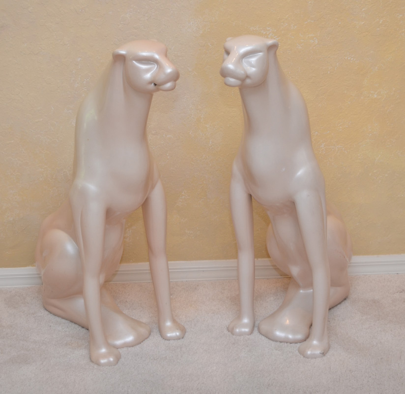 Appraisal: PAIR OF PANTHERS Approx ''h each with openings at the