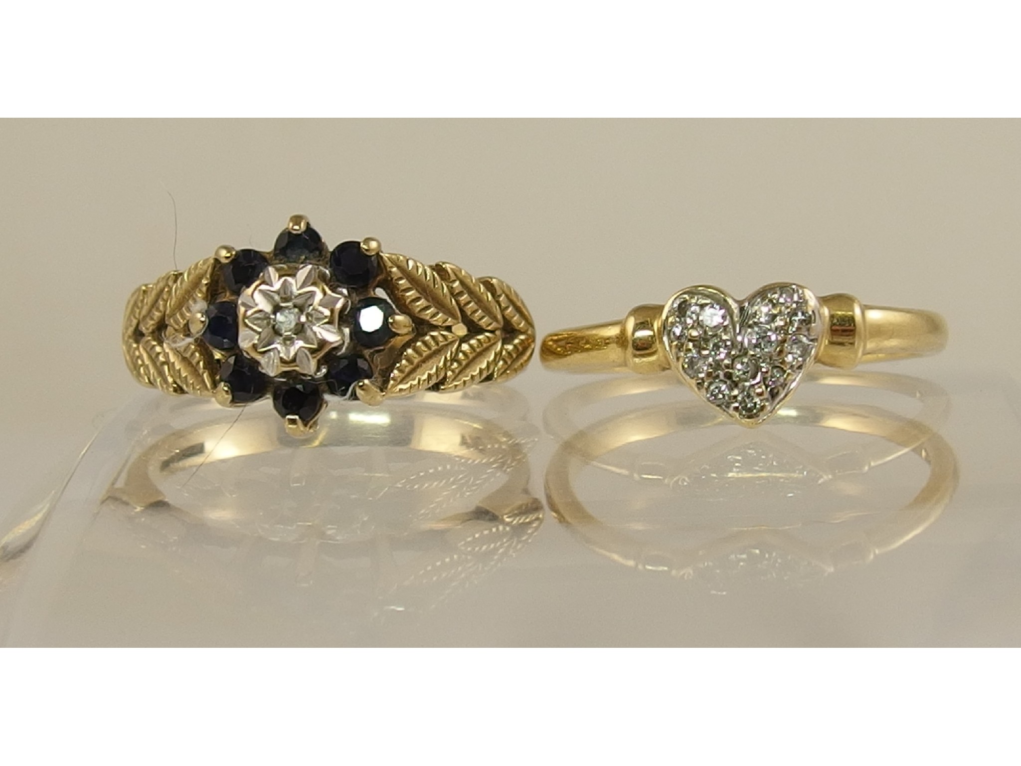 Appraisal: An ct diamond set heart ring together with a ct