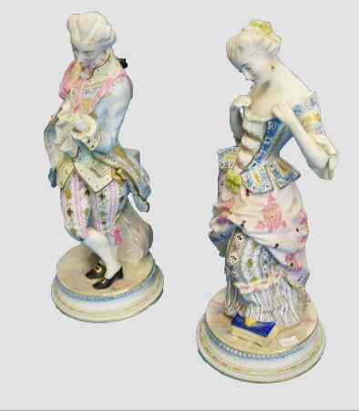 Appraisal: A pair Of Continental Style coloured Bisque Figures Of Regency