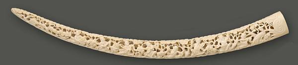 Appraisal: A large reticulated ivory tusk with figural decoration th Century