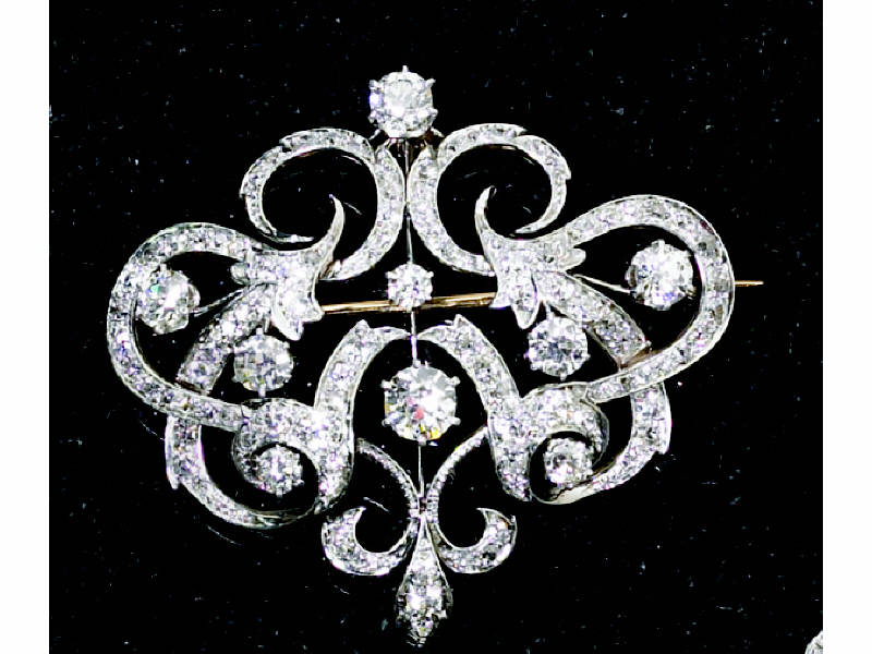 Appraisal: DIAMOND BROOCH K yellow gold with white top set with