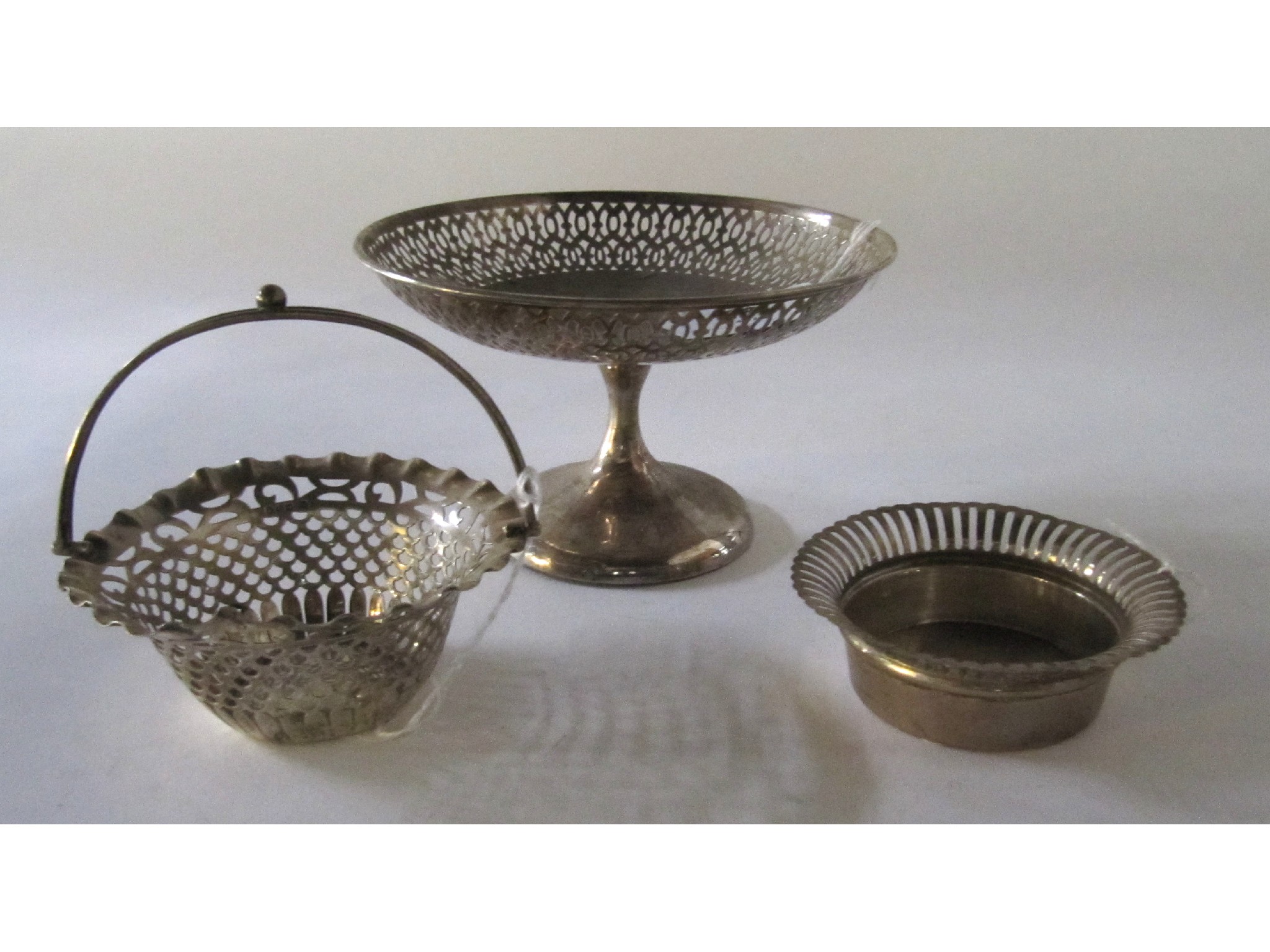 Appraisal: A lot comprising a silver comport a small basket and