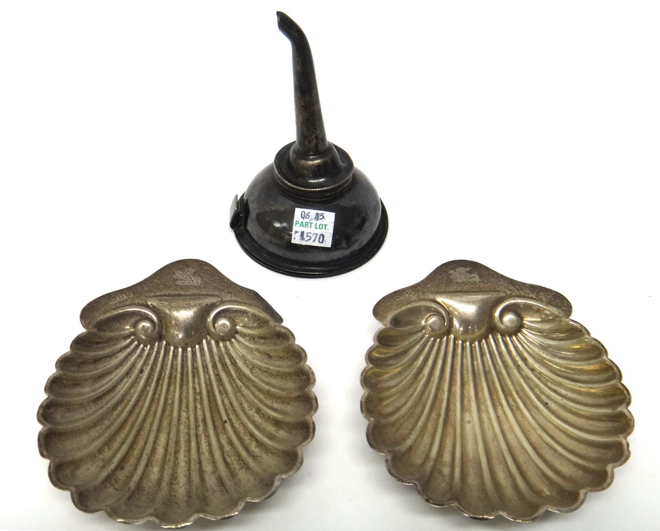 Appraisal: Silver comprising a pair of butter shells each raised on