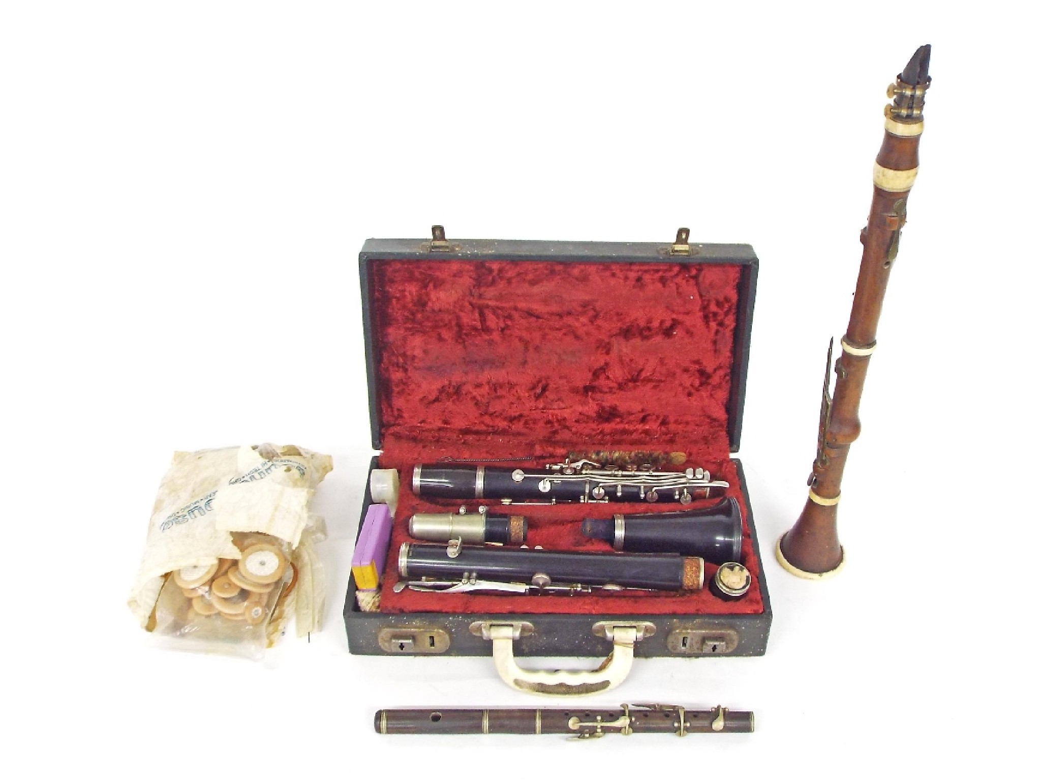 Appraisal: th century boxwood and ivory mounted eight keyed clarinet by