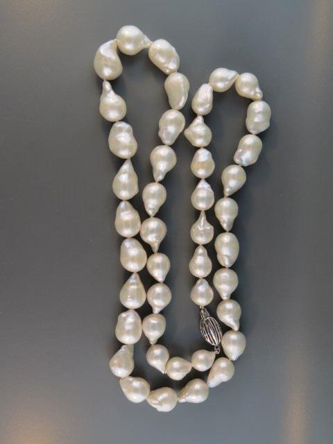 Appraisal: Pearl Necklace lusterous baroque pearls k white gold clasp long