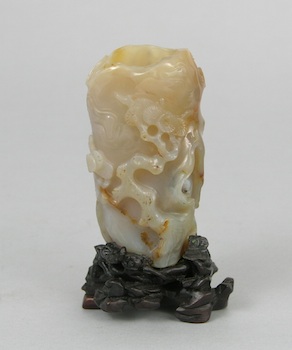 Appraisal: A Carved Agate Tree Trunk Brush Holder Chinese A finely