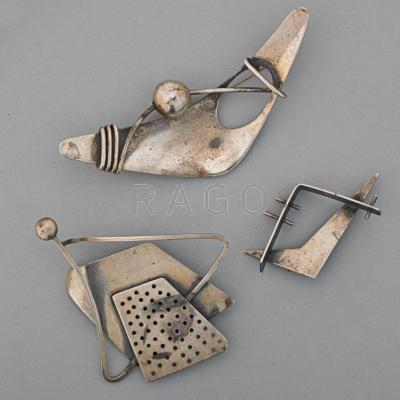 Appraisal: MODERNIST SILVER BROOCHES ca Three sculptural asymmetric assemblages by Bill