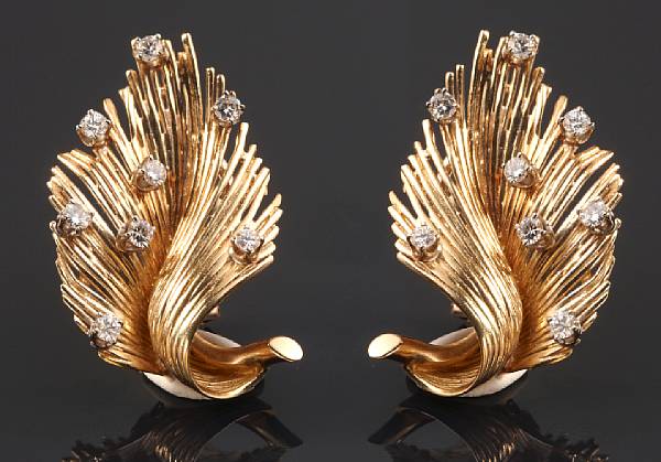 Appraisal: A pair of diamond and gold earclips