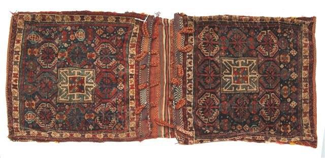 Appraisal: A PAIR OF TURKISH BLUE GROUND SADDLE BAGS - central