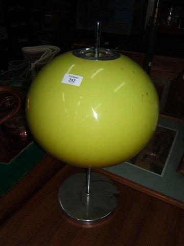 Appraisal: An Italian designer table lamp with lime green ovoid shade