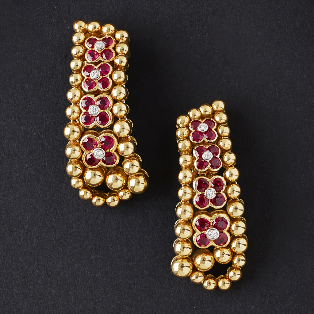 Appraisal: MOUAWAD - A pair of ruby and diamond set pendant