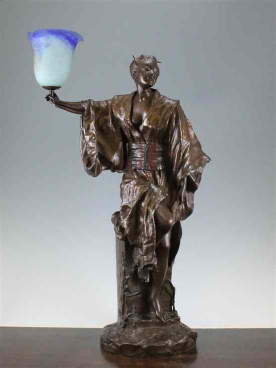 Appraisal: Gaston Leroux - A large bronze figural lamp modelled as