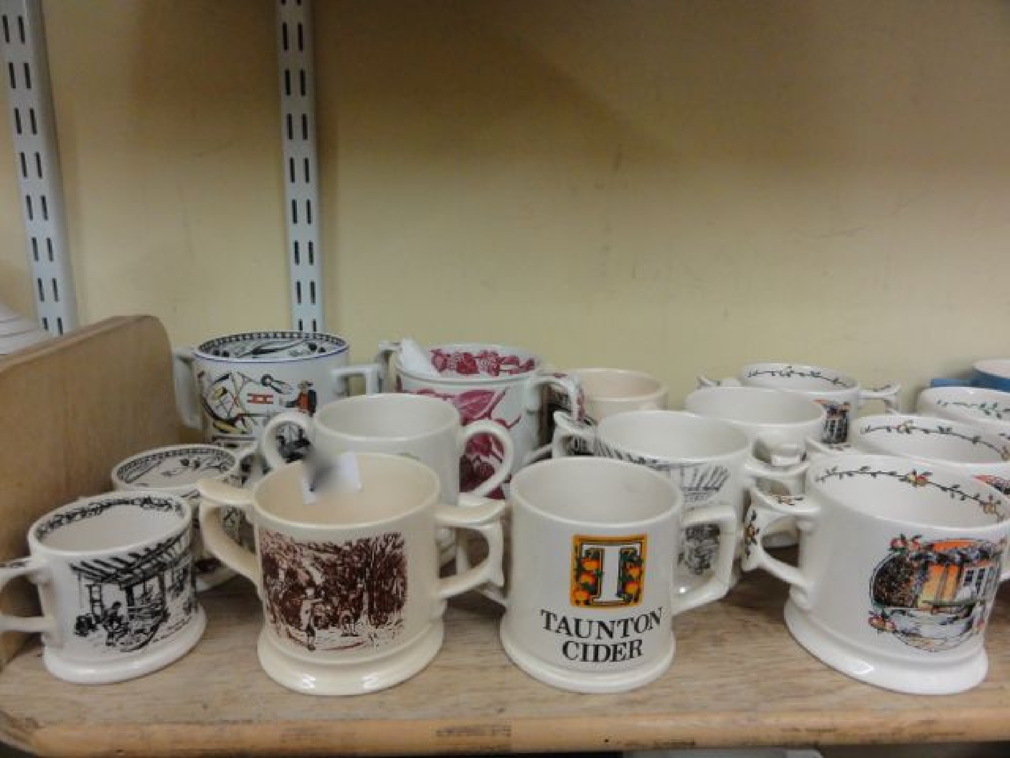 Appraisal: A quantity of drink related ceramics including Taunton Cider two