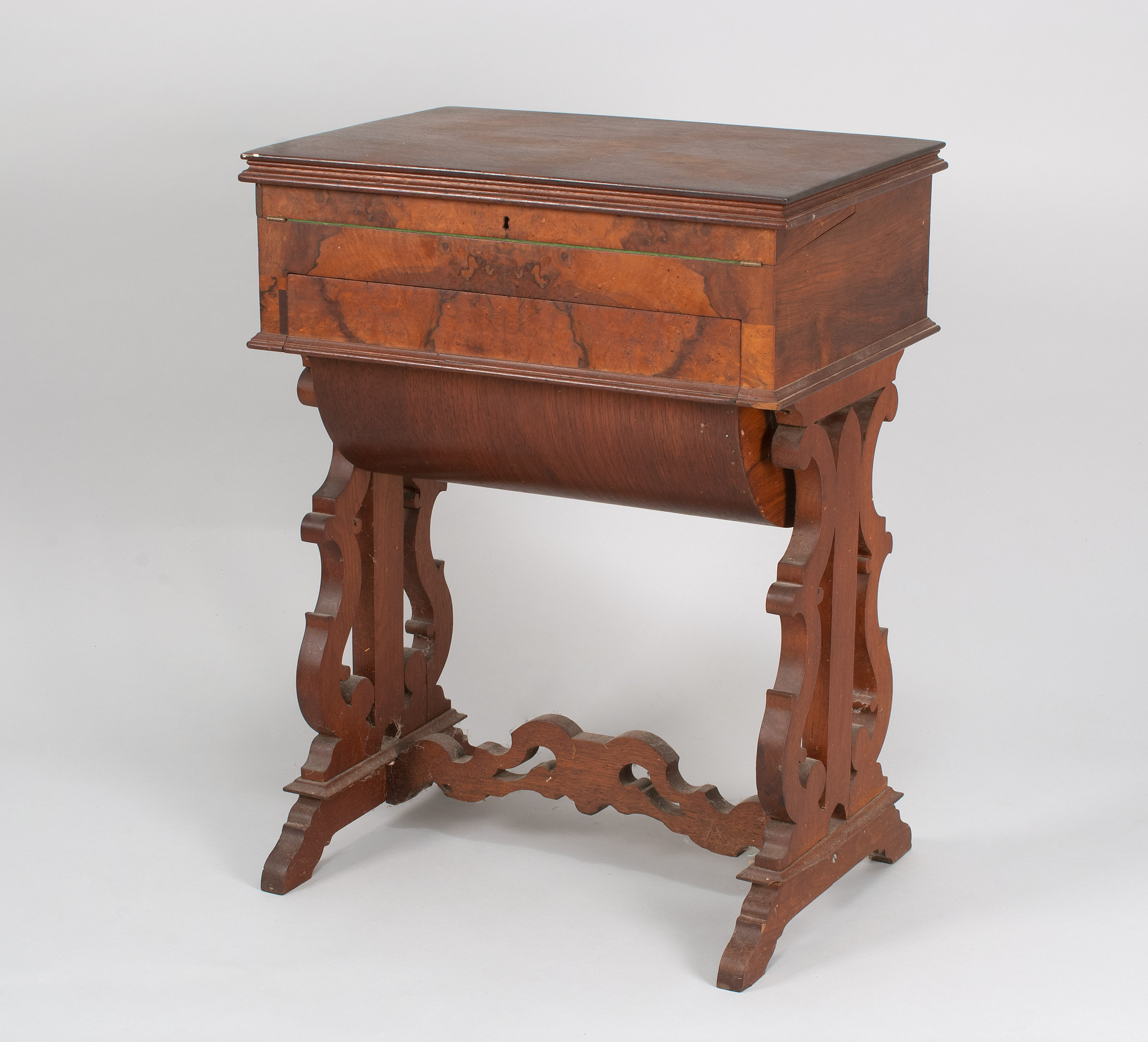 Appraisal: MID- TH CENTURY ROSEWOOD AND WALNUT WORK TABLE with molded